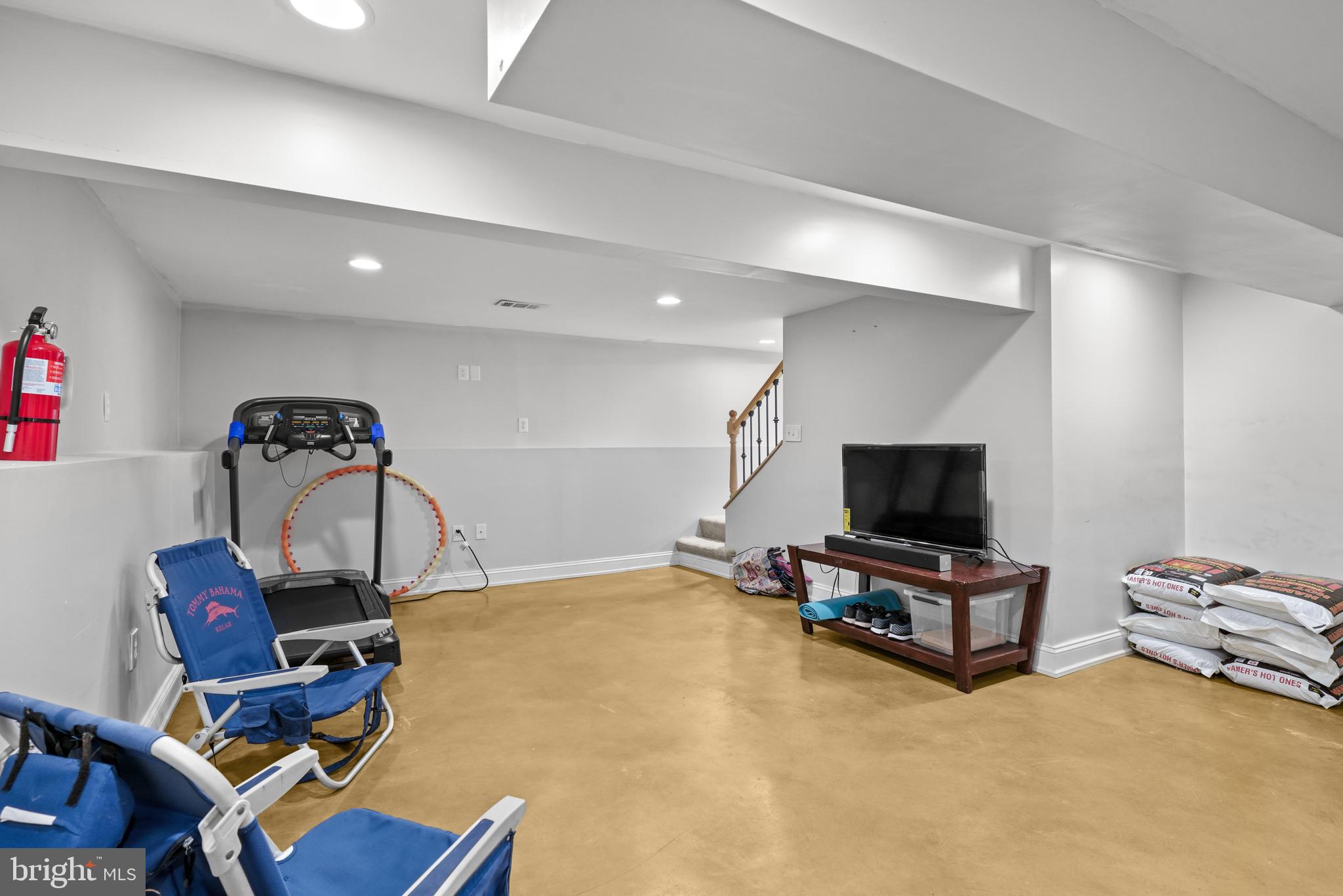 1435 Shadyrest Road Shady Side, MD 20764 - Photo 31 of 36 a room with furniture and flat screen tv