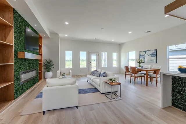 a living room with furniture and a table