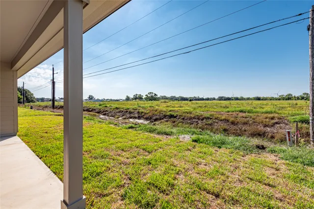 a view of swimming pool from a window