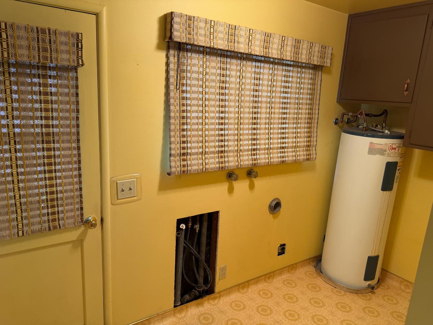 231 Boarman Street Jackson, CA 95642 - Photo 21 of 65 Back porch laundry hookup and rear door