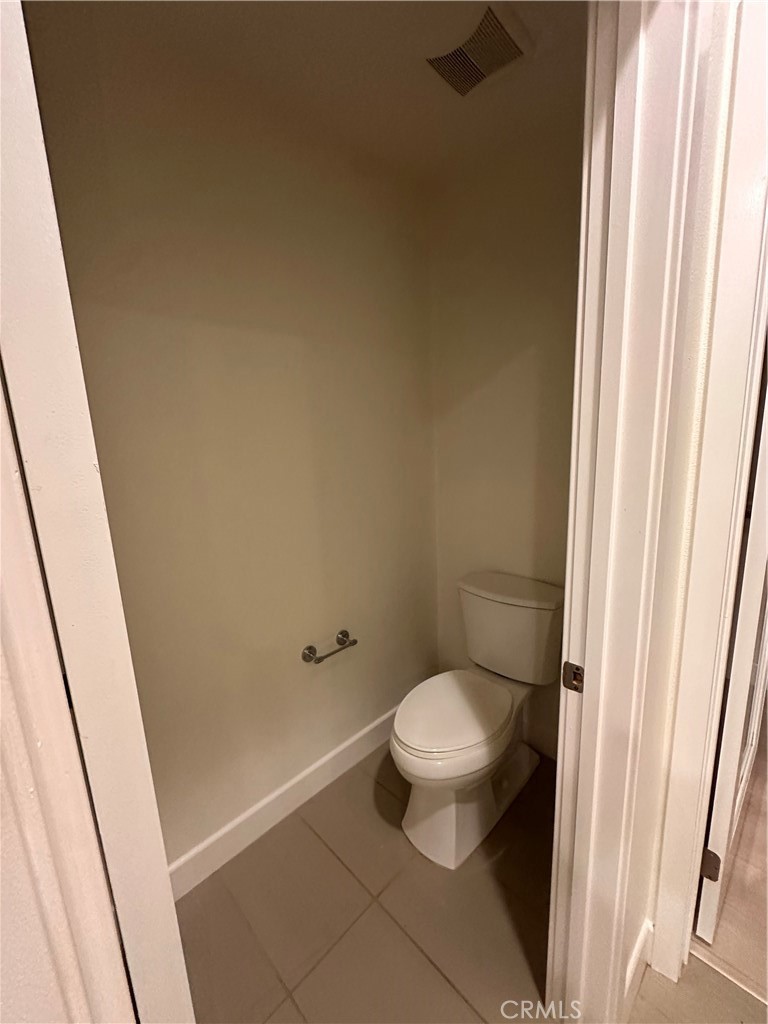 27 Soho Irvine, CA 92612 - Photo 20 of 69 a bathroom with a toilet and a shower