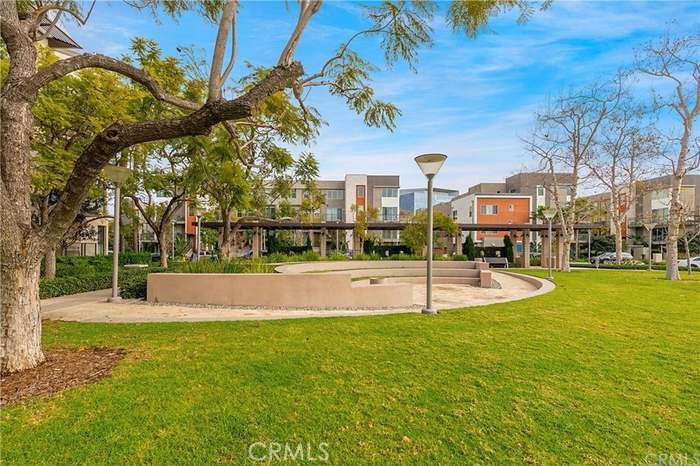 27 Soho Irvine, CA 92612 - Photo 53 of 69 a view of yard with swimming pool and tall trees