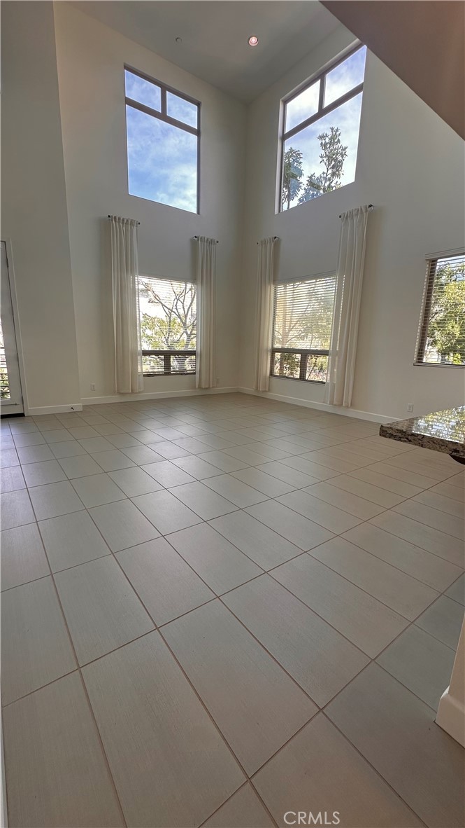 27 Soho Irvine, CA 92612 - Photo 7 of 69 an empty room with windows and fan