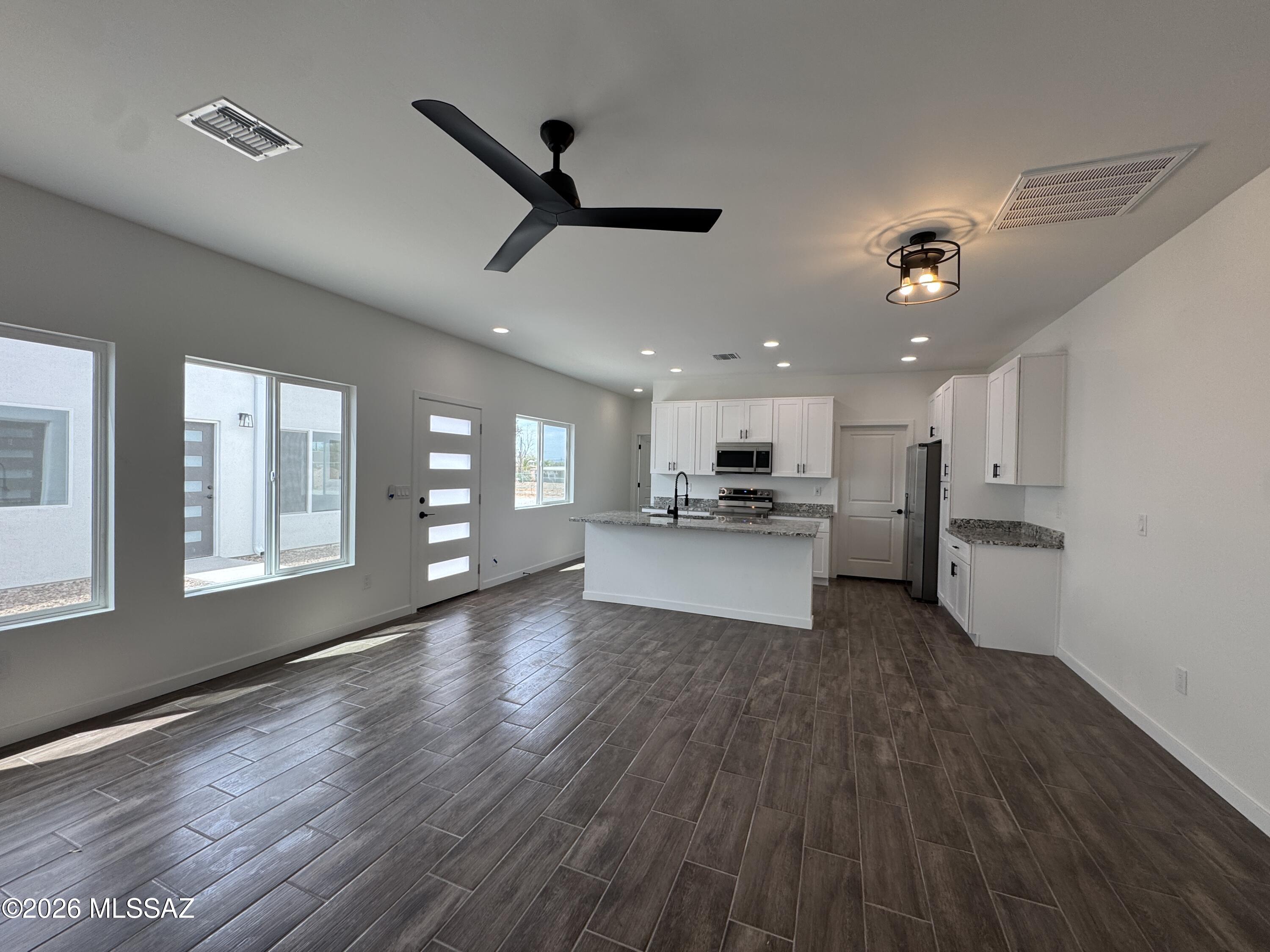 2130 North Ralph Avenue, Unit 1 Tucson, AZ 85712 - Photo 2 of 11 a view of kitchen with sink and wooden floor