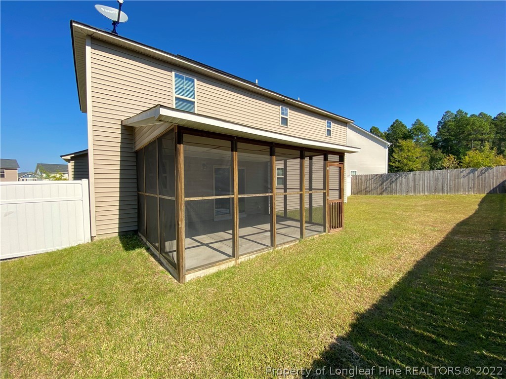 76 Loyalist Road Cameron, NC 28326 - Photo 29 of 34 a view of a backyard with a swimming pool