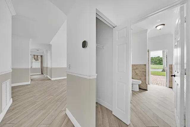 a view of a garden with a building in the background