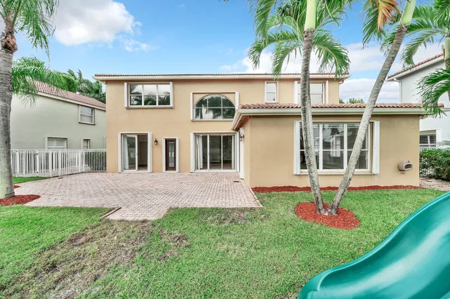 a view of a hallway with windows
