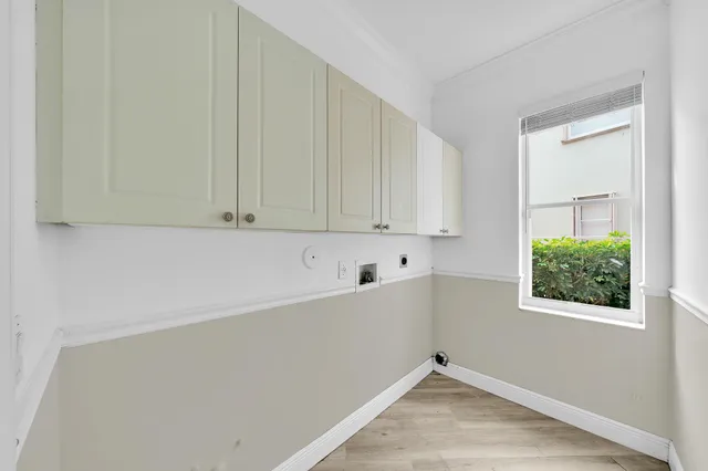 a view of a room with a large window