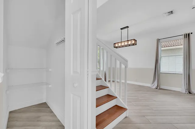 a view of a bathroom with a glass door