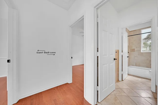 an aerial view of a house with a yard basket ball court and outdoor seating