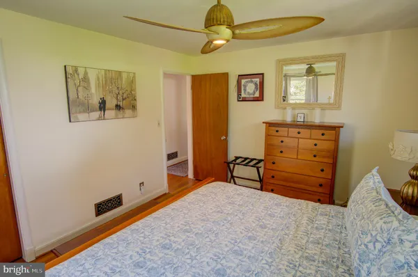 workspace with wooden floor and window