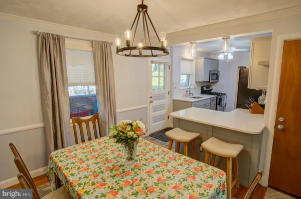 a view of a dining room with furniture