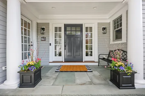 a view of a entryway with flower pots