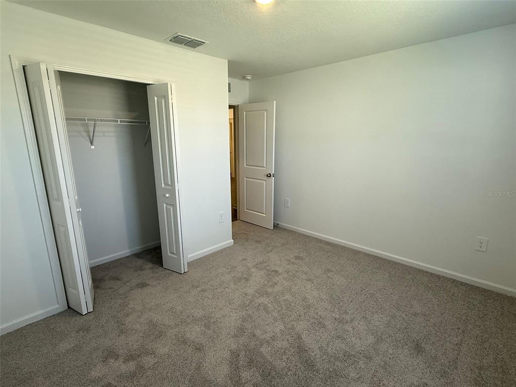4220 Southwest 82nd Lane Ocala, FL 34476 - Photo 11 of 18 an empty room with closet area