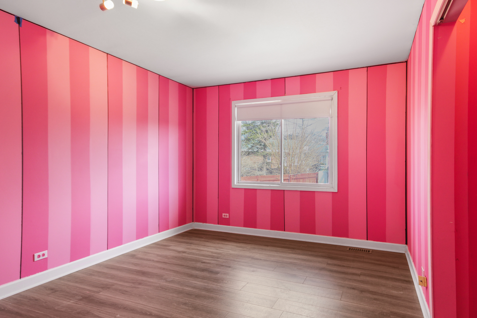 2938 East Shagbark Trail Crete, IL 60417 - Photo 20 of 22 a view of a big room with a window and a red curtain