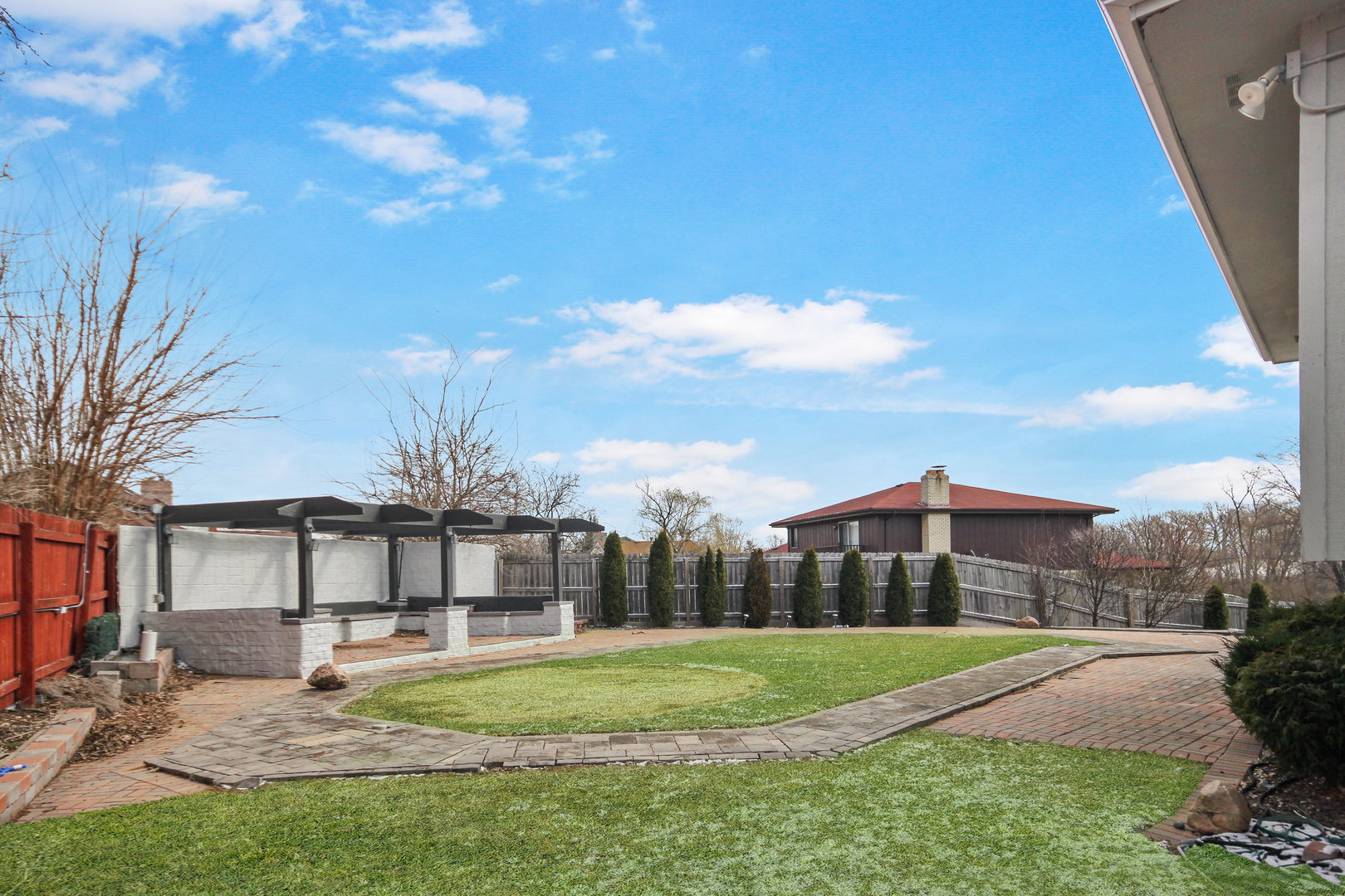 2938 East Shagbark Trail Crete, IL 60417 - Photo 22 of 22 a view of a big house with a big yard and large trees