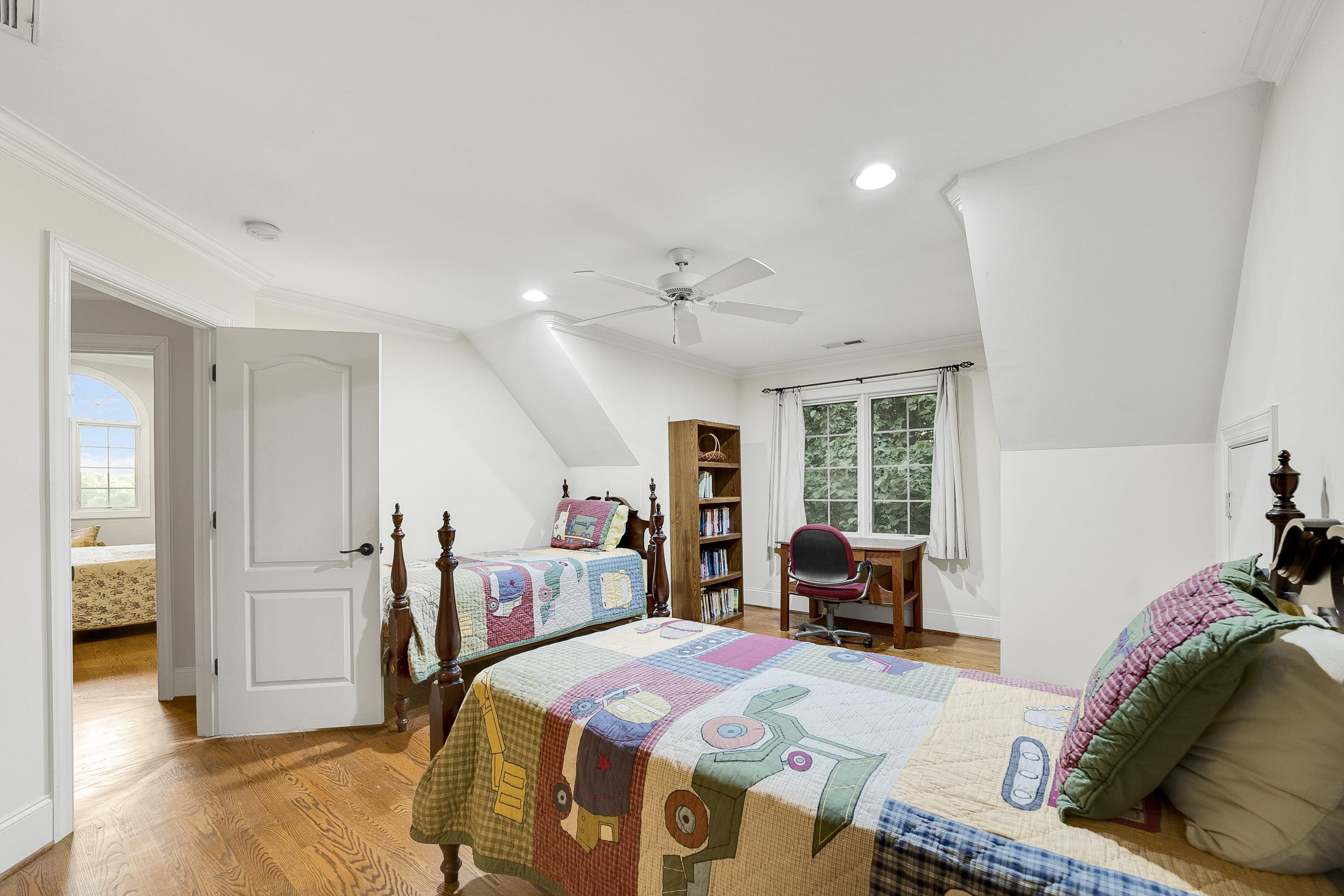 5401 Nicks Road Mebane, NC 27302 - Photo 23 of 53 a bed room with a bed and a large mirror