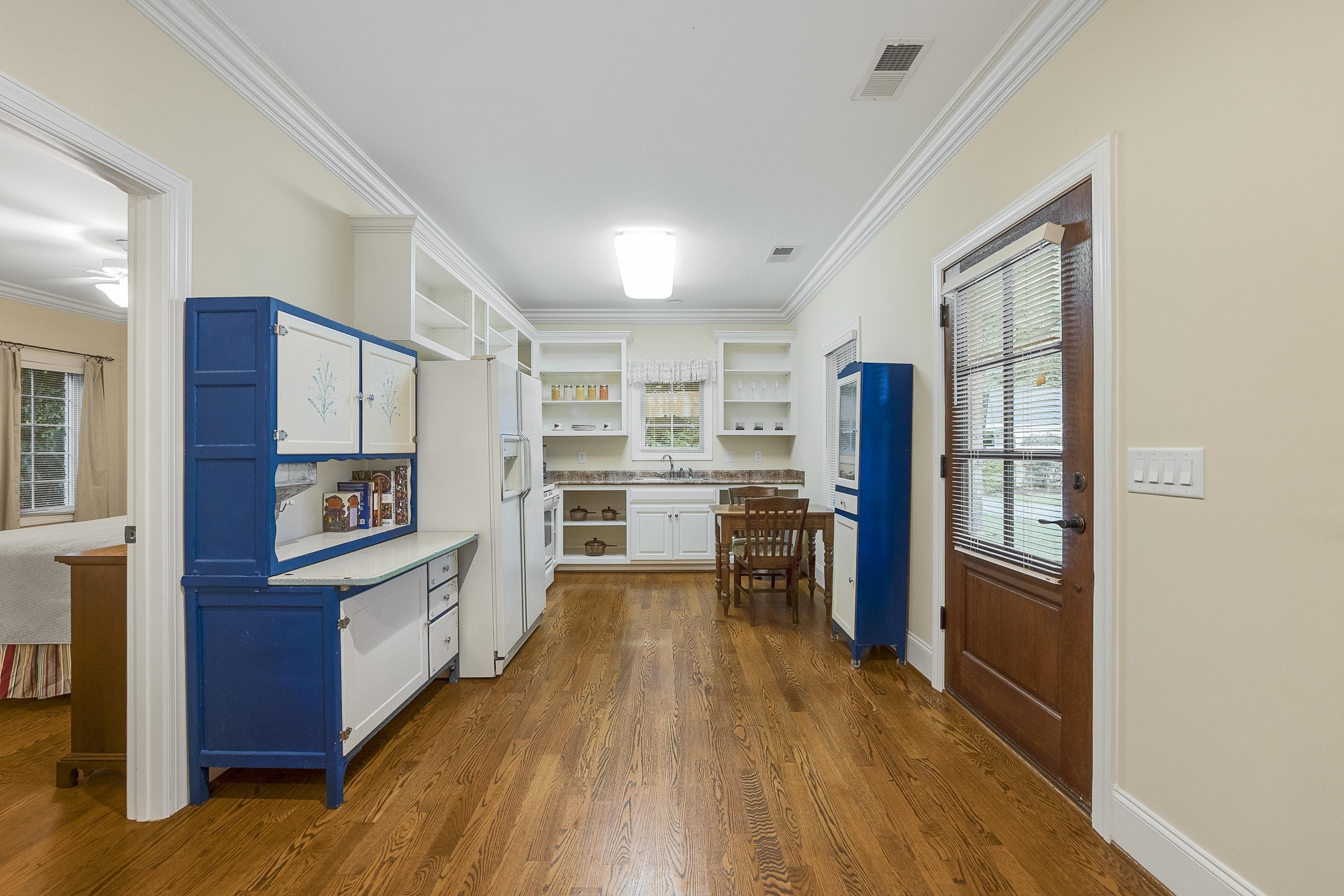 5401 Nicks Road Mebane, NC 27302 - Photo 31 of 53 a kitchen with stainless steel appliances a refrigerator and a stove top oven
