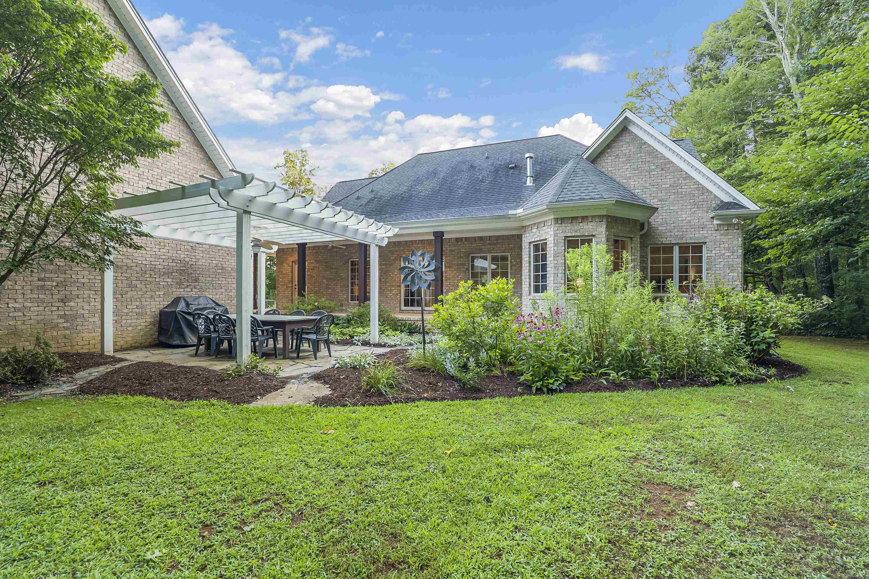 5401 Nicks Road Mebane, NC 27302 - Photo 41 of 53 a view of a house with a yard and sitting area