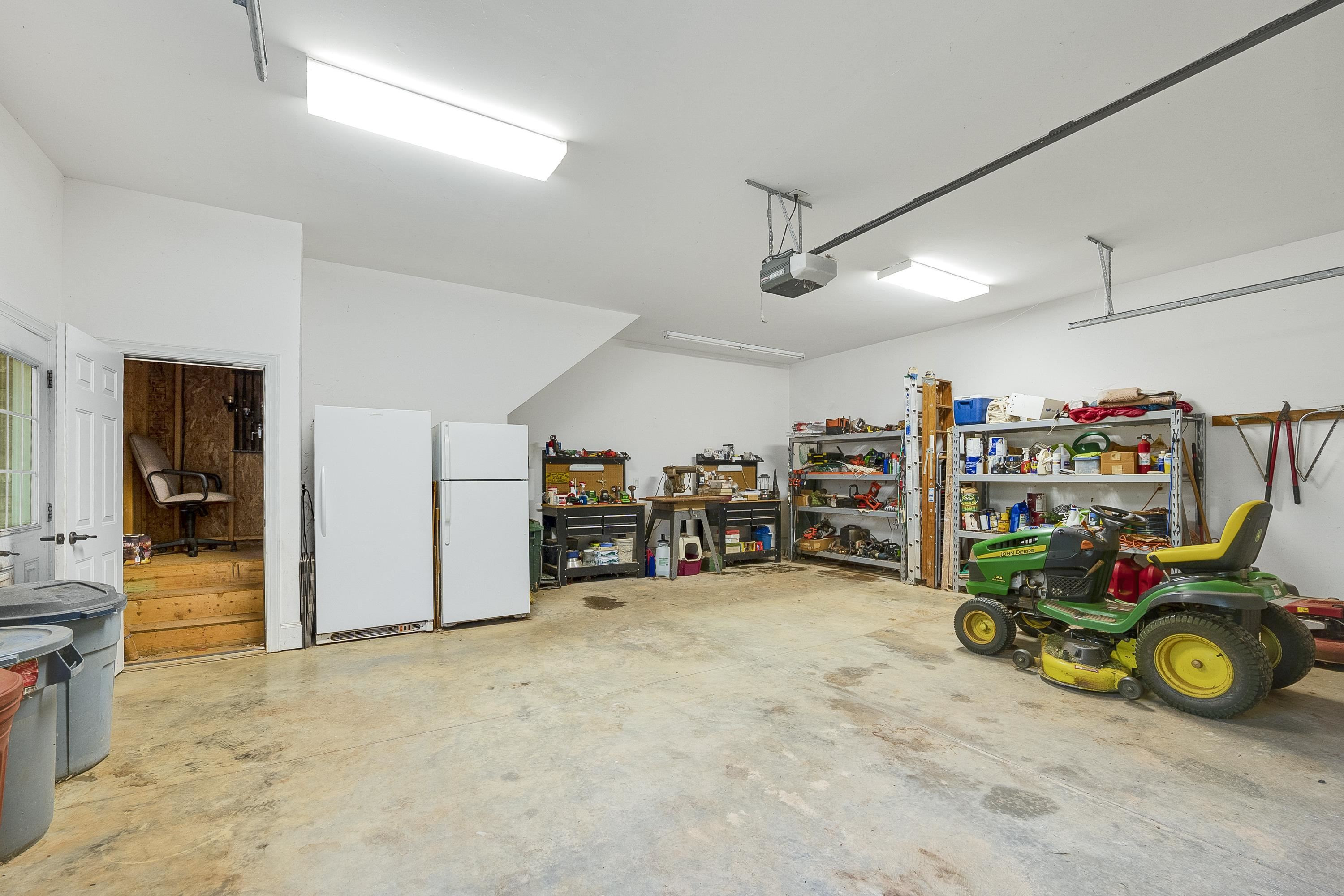 5401 Nicks Road Mebane, NC 27302 - Photo 44 of 53 a view of a garage with equipment
