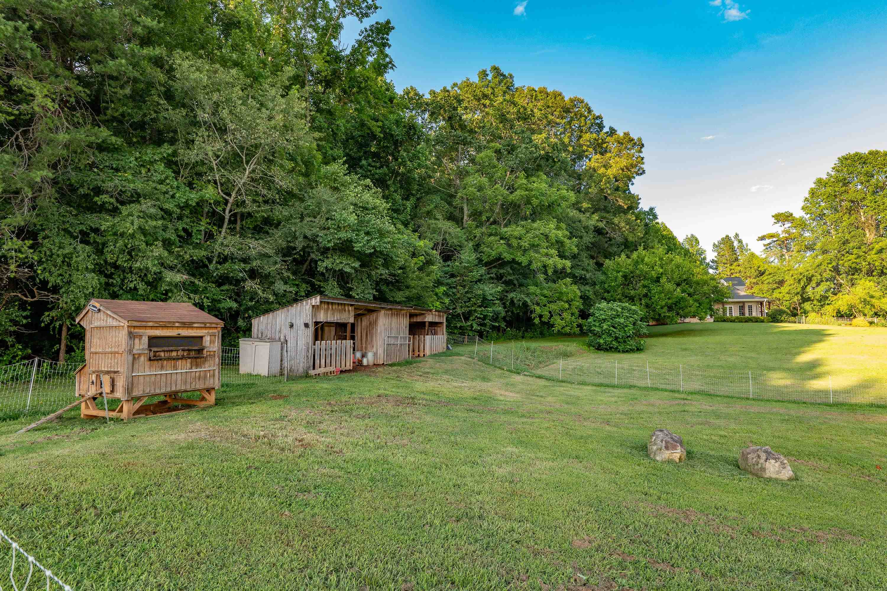 5401 Nicks Road Mebane, NC 27302 - Photo 47 of 53 a view of a house with a yard