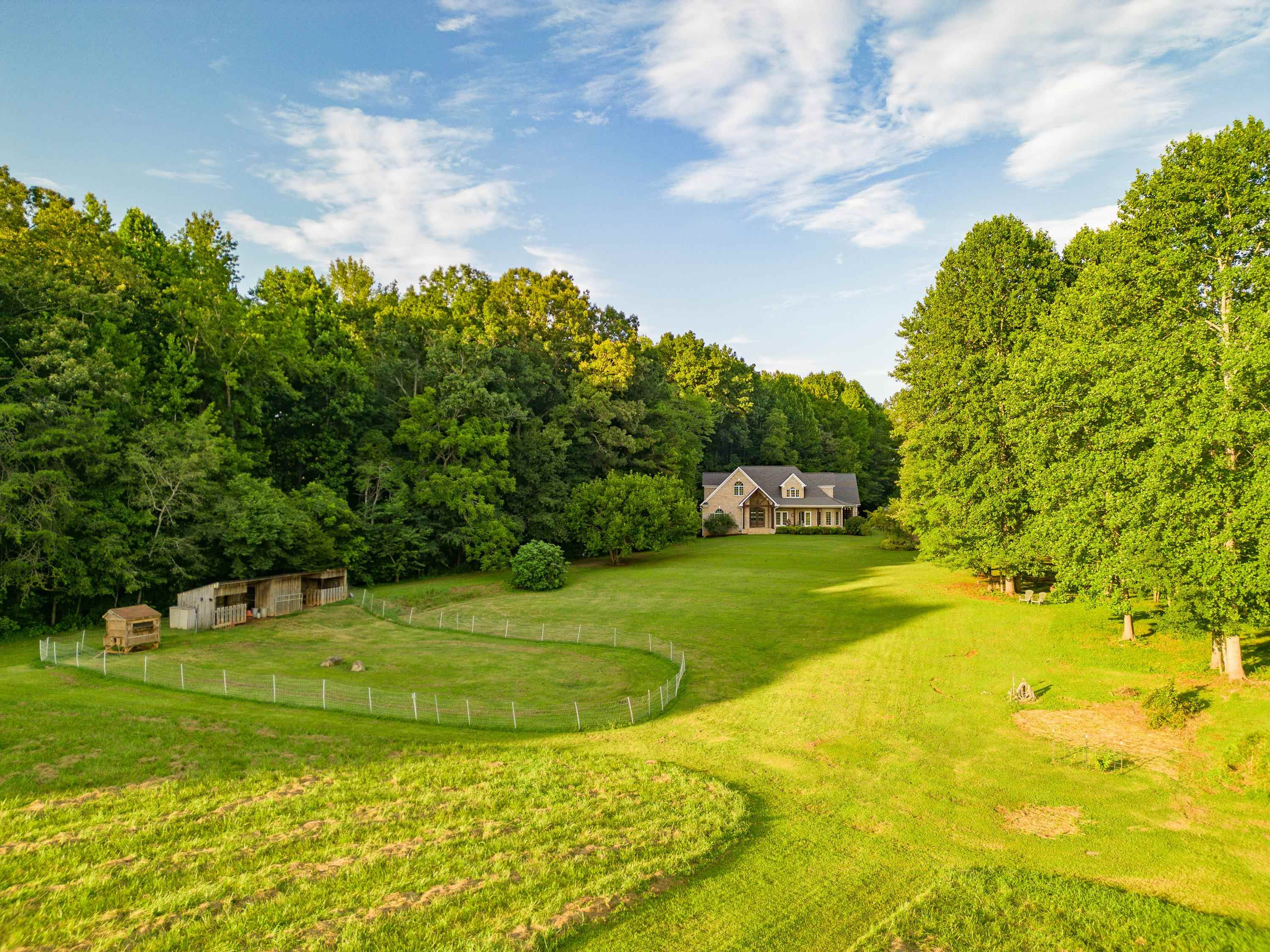 5401 Nicks Road Mebane, NC 27302 - Photo 49 of 53 a view of a golf course with a garden