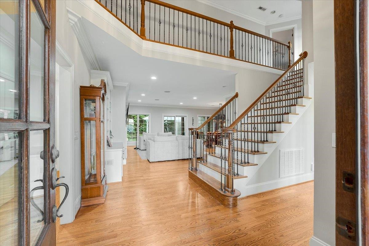 5401 Nicks Road Mebane, NC 27302 - Photo 6 of 53 a view of entryway and hall with wooden floor