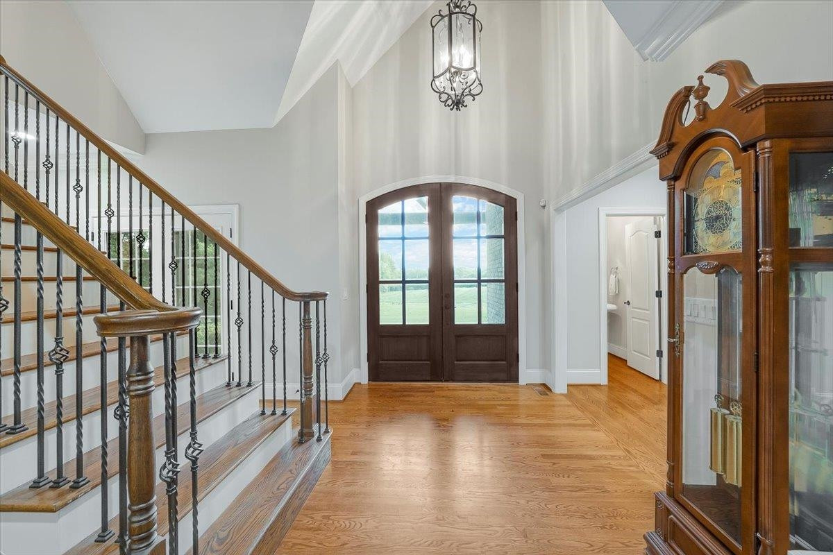 5401 Nicks Road Mebane, NC 27302 - Photo 7 of 53 a view of an entryway door with wooden floor