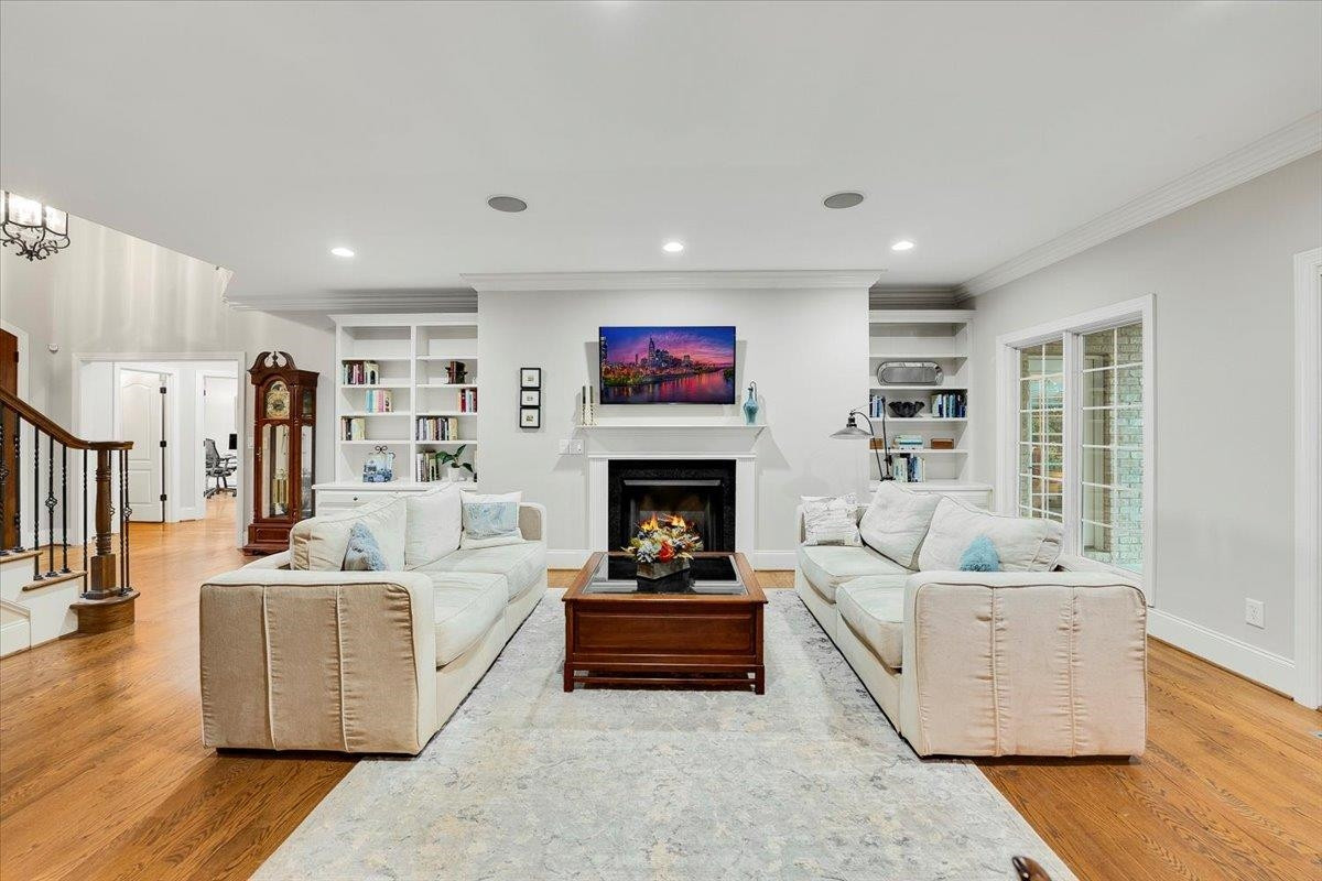 5401 Nicks Road Mebane, NC 27302 - Photo 8 of 53 a living room with furniture and a fireplace