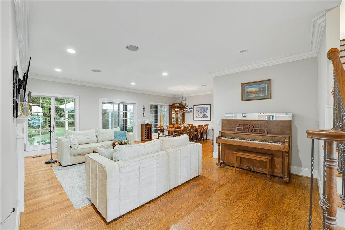 5401 Nicks Road Mebane, NC 27302 - Photo 9 of 53 a living room with furniture and a wooden floor