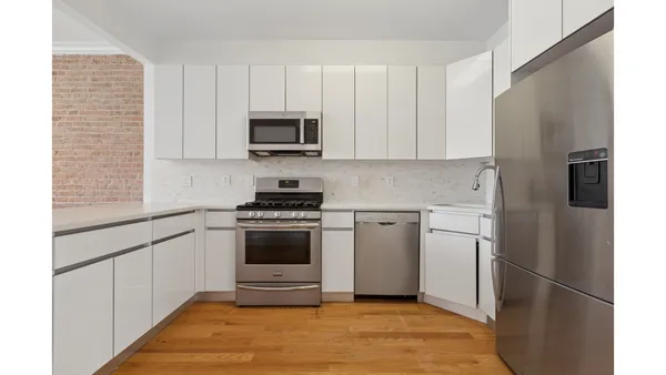 a picture of a room with a white wall and a white wall