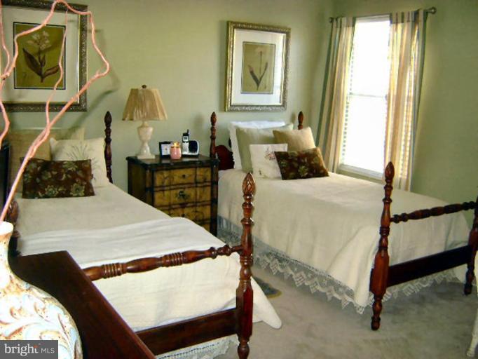 604 Churchill Road, Unit O Bel Air, MD 21014 - Photo 16 of 30 a bedroom with a bed and a window