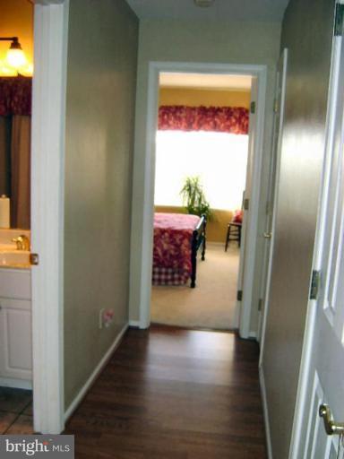 604 Churchill Road, Unit O Bel Air, MD 21014 - Photo 23 of 30 a view of a hallway with wooden floor