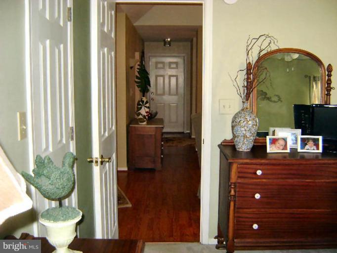 604 Churchill Road, Unit O Bel Air, MD 21014 - Photo 27 of 30 a living room with furniture and a potted plant