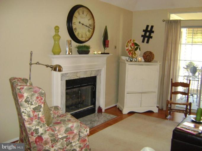 604 Churchill Road, Unit O Bel Air, MD 21014 - Photo 5 of 30 a living room with furniture and a fireplace