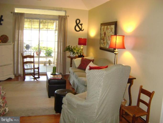 604 Churchill Road, Unit O Bel Air, MD 21014 - Photo 8 of 30 a living room with furniture and a window