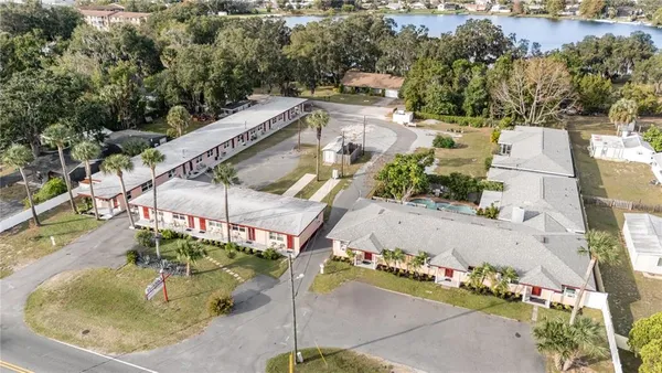 aerial view of a house with a yard