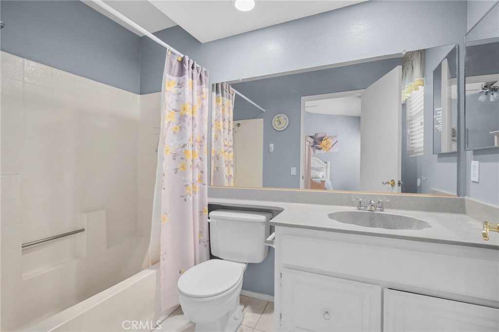 8264 Mondavi Place Rancho Cucamonga, CA 91730 - Photo 29 of 34 a bathroom with a sink toilet and shower