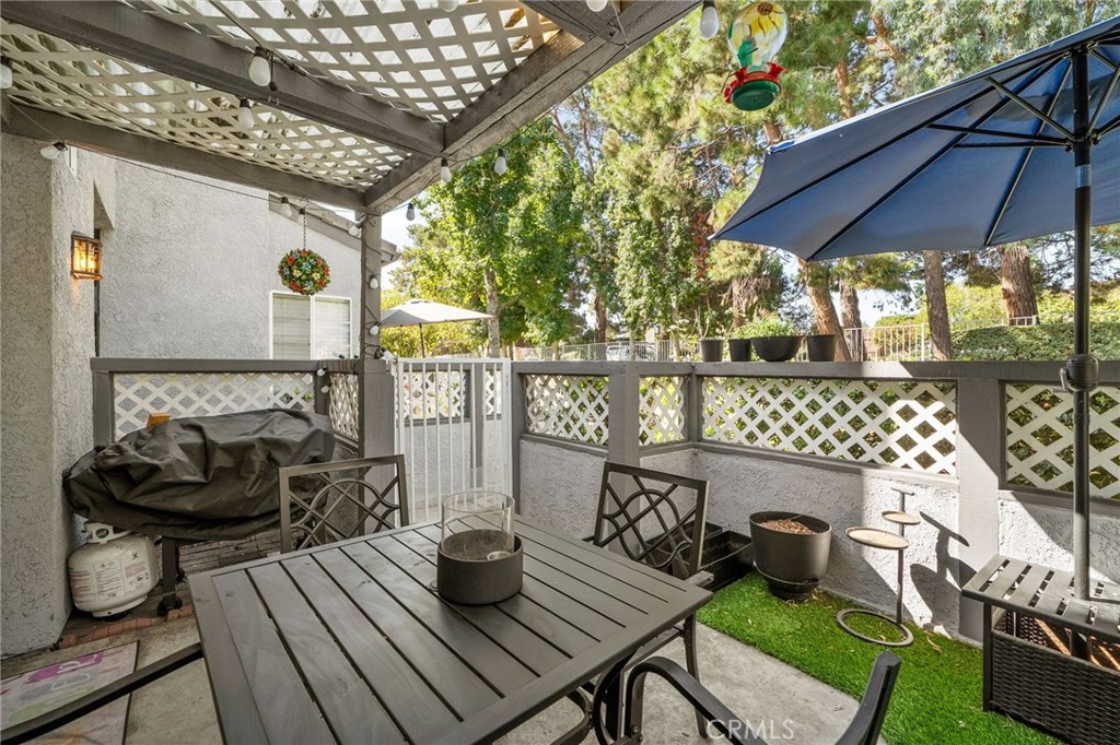 8264 Mondavi Place Rancho Cucamonga, CA 91730 - Photo 6 of 34 a balcony with wooden floor and furniture