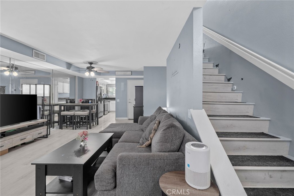 8264 Mondavi Place Rancho Cucamonga, CA 91730 - Photo 7 of 34 a living room with furniture and a flat screen tv