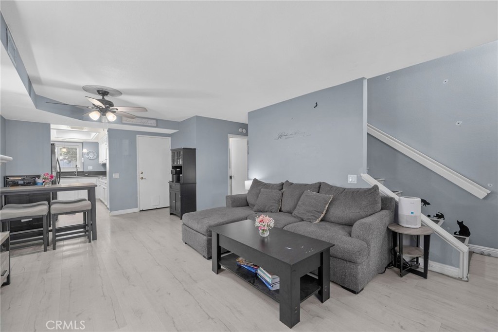 8264 Mondavi Place Rancho Cucamonga, CA 91730 - Photo 10 of 34 a living room with furniture and a wooden floor