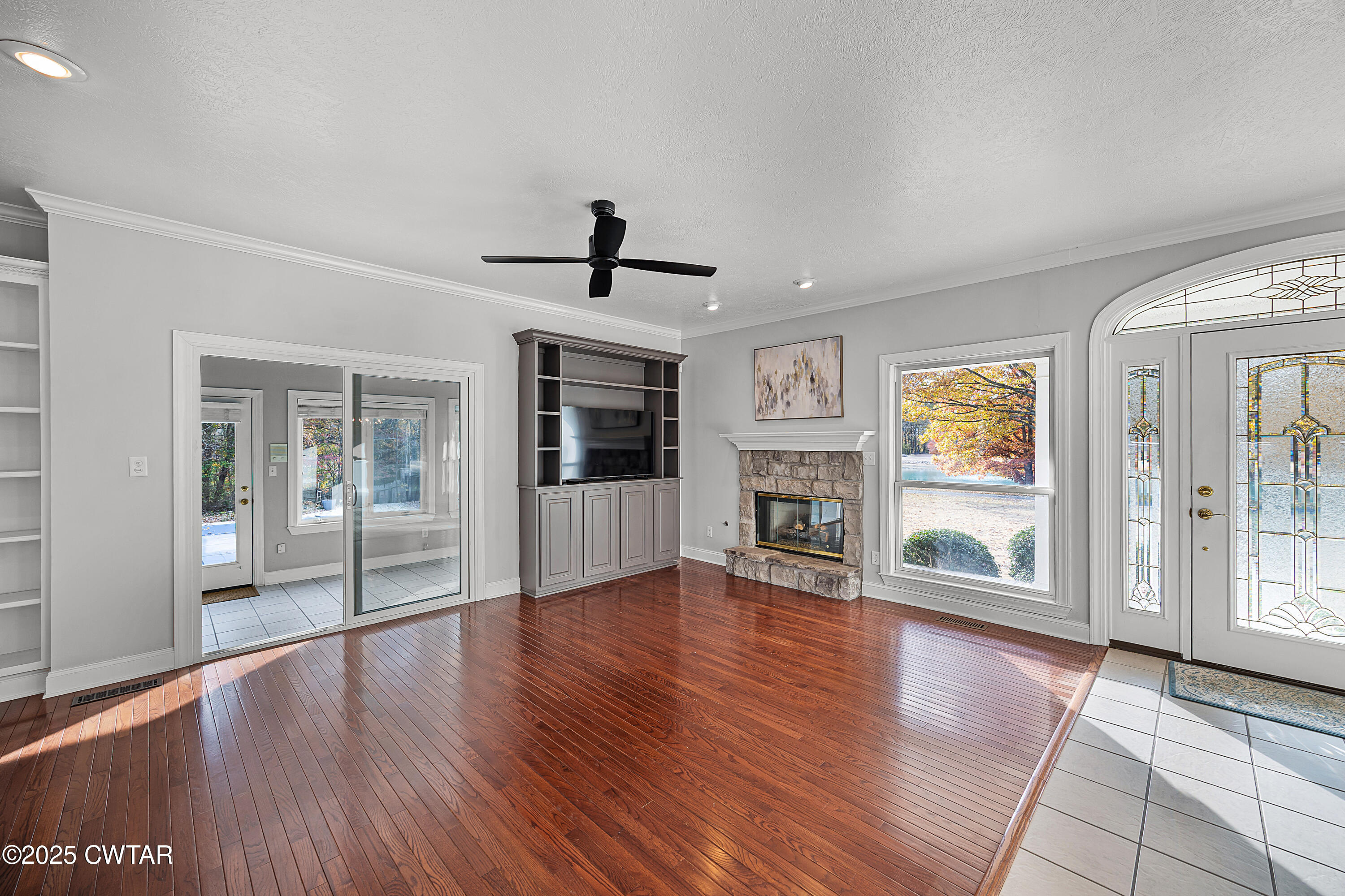 433 Sanders Bluff Road Three Way, TN 38343 - Photo 11 of 43 a view of an empty room with window and wooden floor