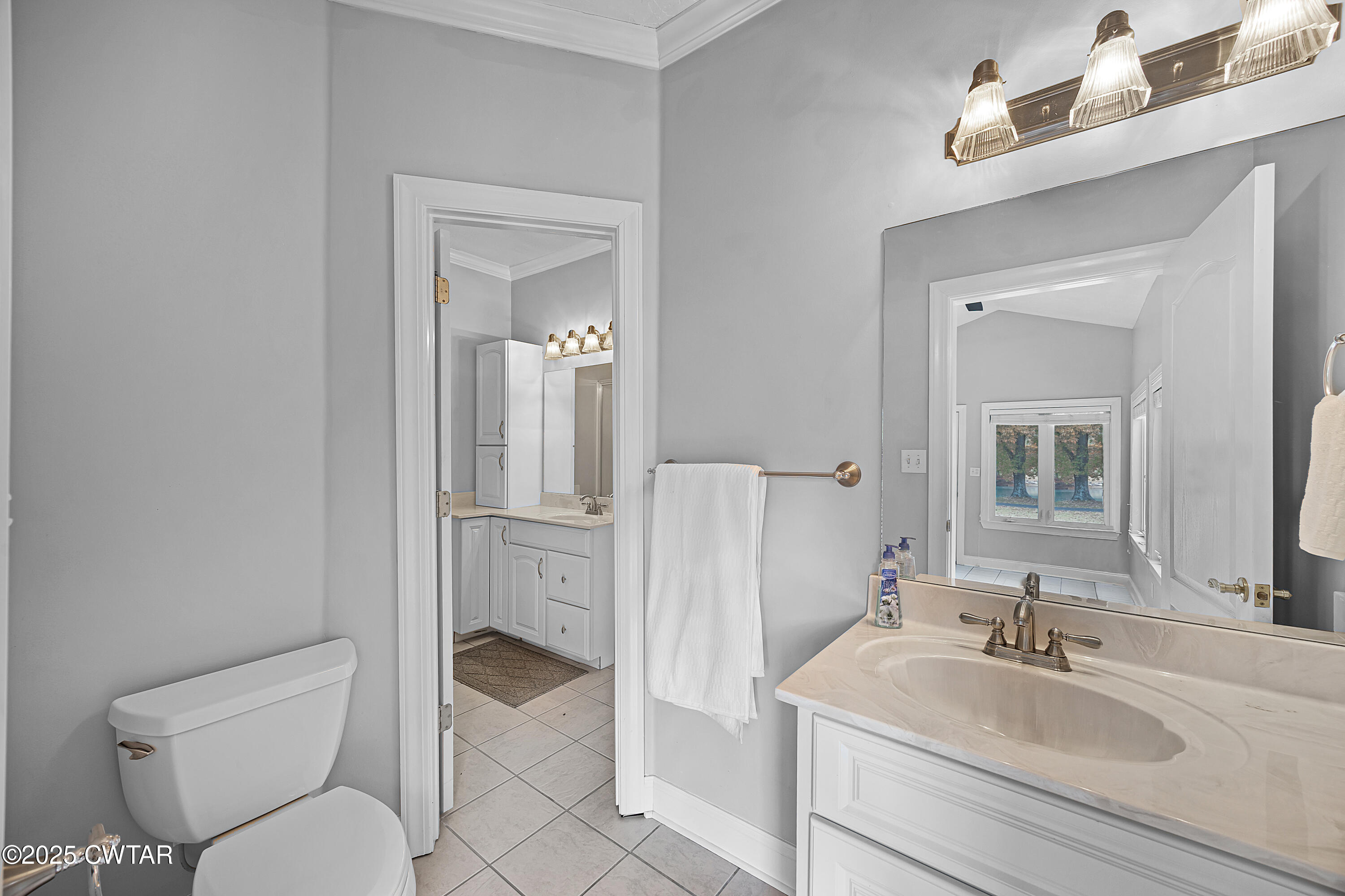 433 Sanders Bluff Road Three Way, TN 38343 - Photo 20 of 43 a bathroom with a toilet sink and shower