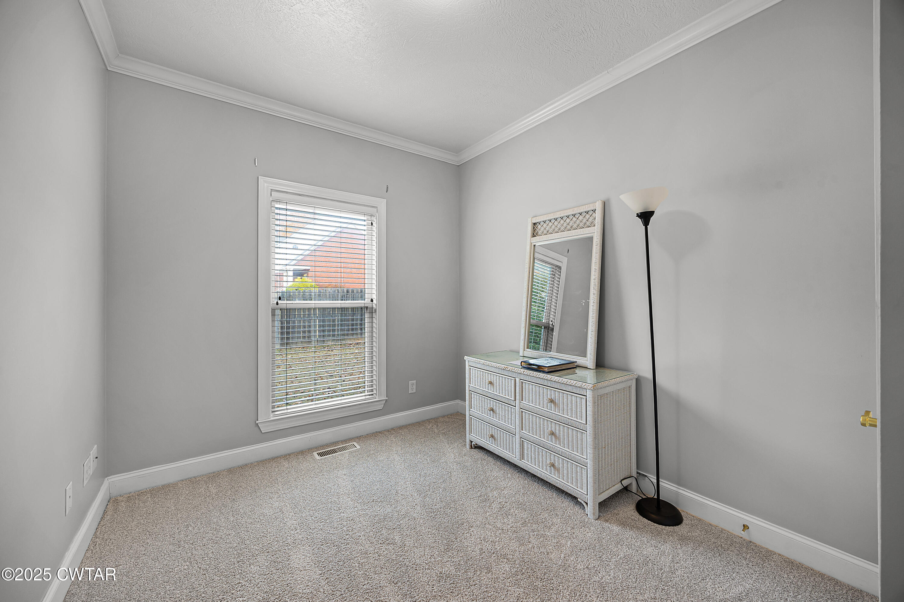 433 Sanders Bluff Road Three Way, TN 38343 - Photo 22 of 43 a view of an empty room with window and cabinet