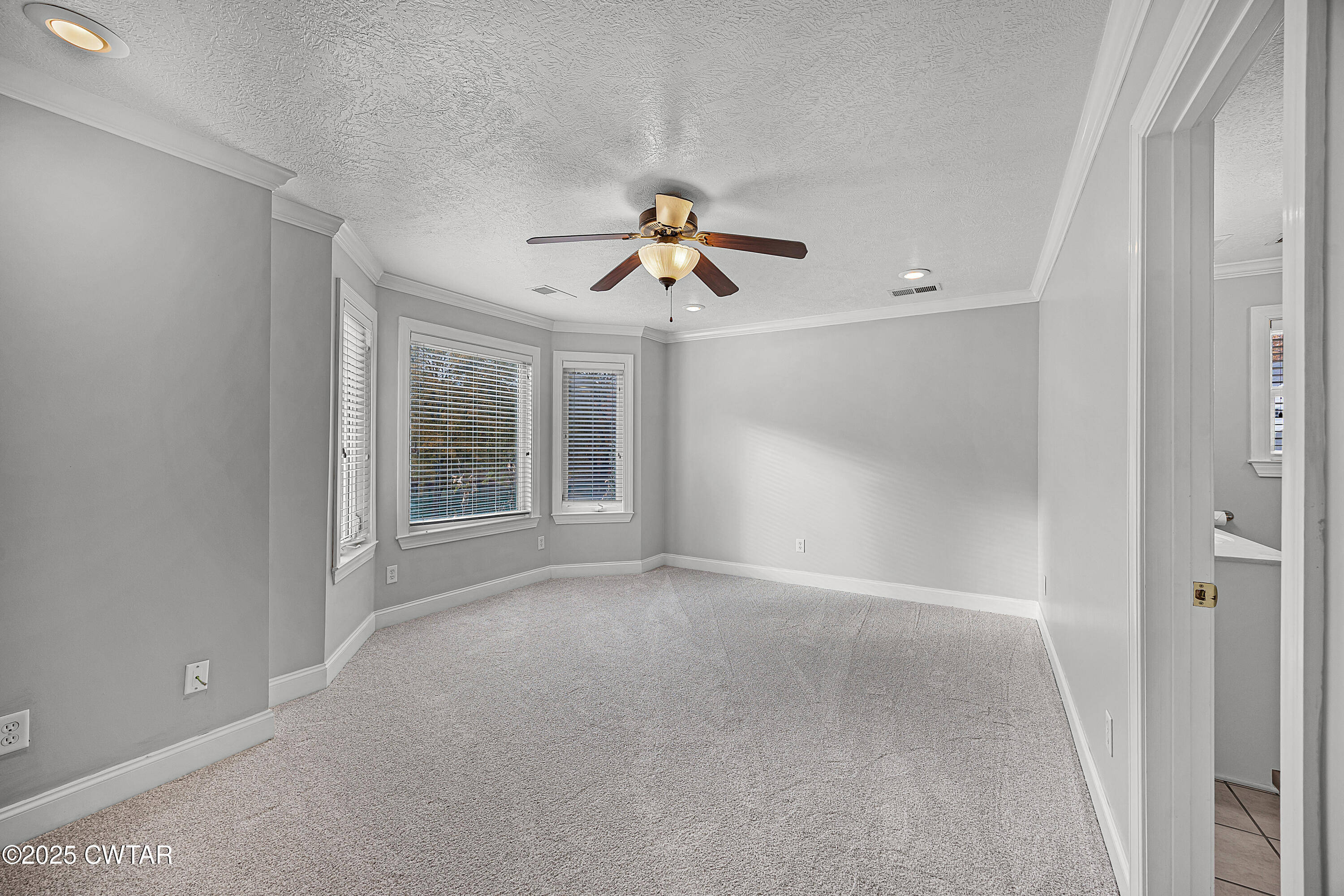433 Sanders Bluff Road Three Way, TN 38343 - Photo 29 of 43 a view of a room with a ceiling fan and window