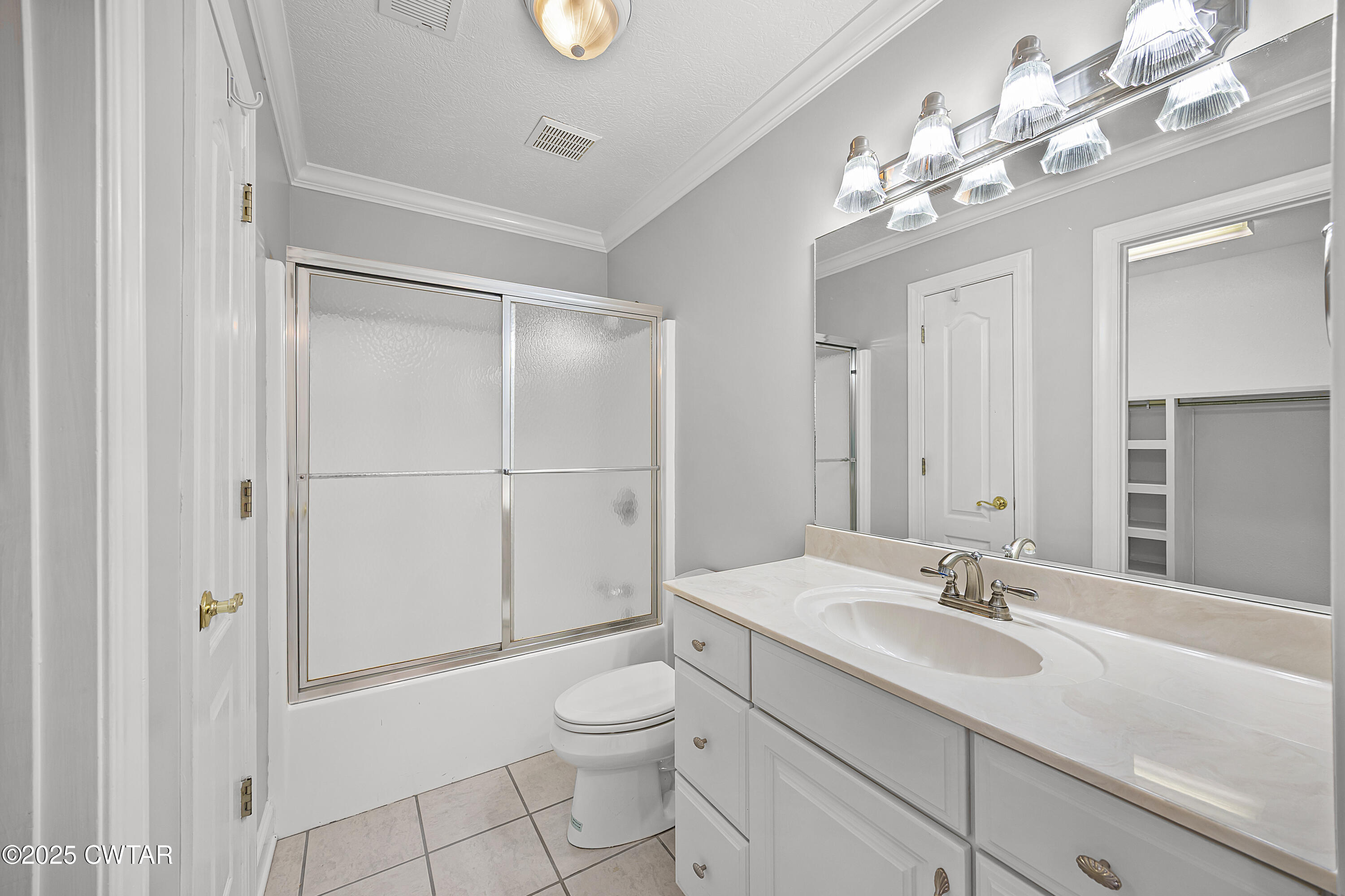 433 Sanders Bluff Road Three Way, TN 38343 - Photo 32 of 43 a bathroom with a sink a toilet and shower