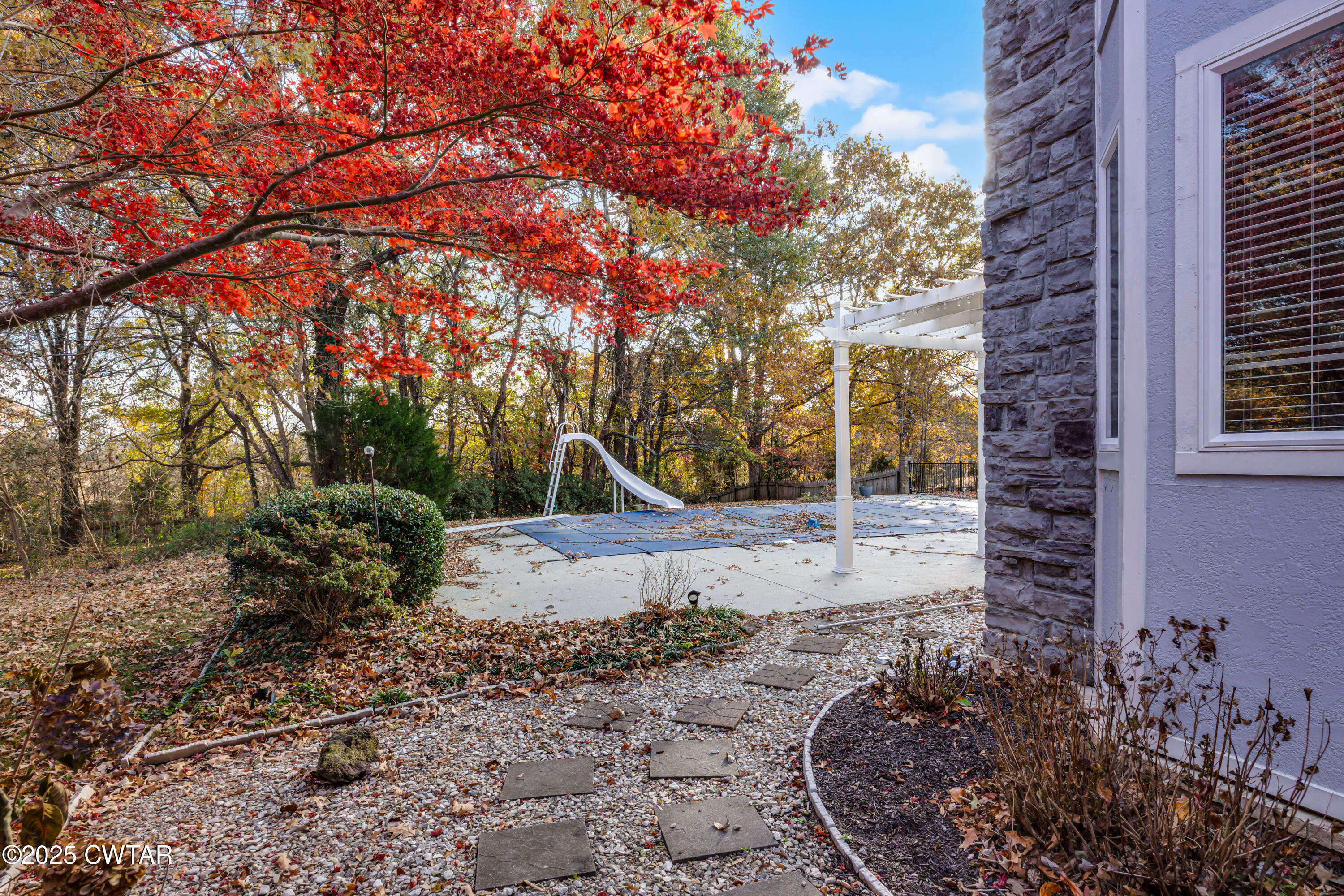 433 Sanders Bluff Road Three Way, TN 38343 - Photo 36 of 43 a view of a backyard with fountain