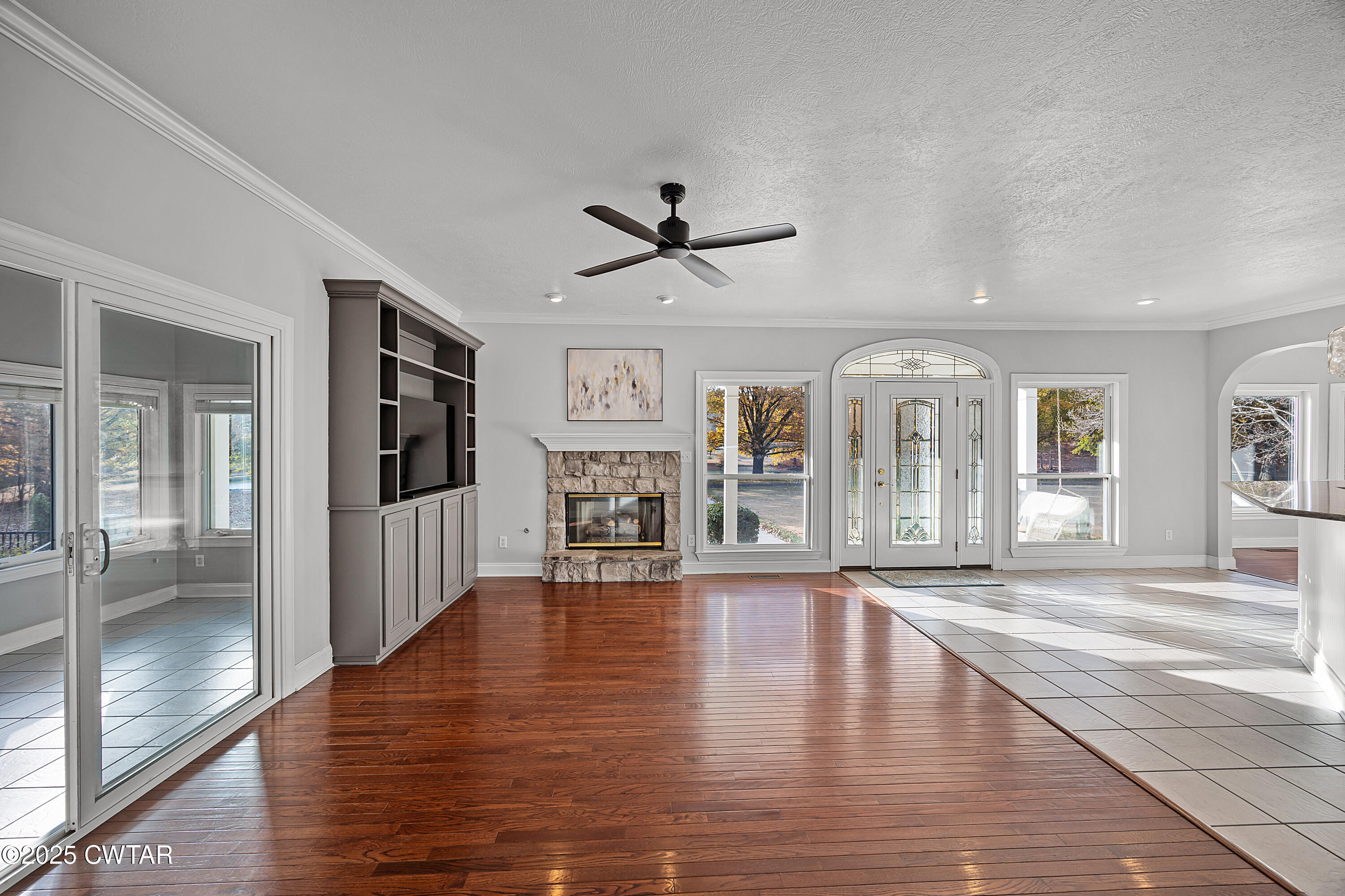 433 Sanders Bluff Road Three Way, TN 38343 - Photo 10 of 43 a view of an empty room with window and wooden floor