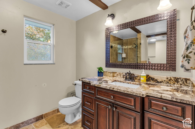 1073 Pineridge Road Sandy, UT 84094 - Photo 16 of 31 Vanity with an integrated sink, decorative framed mirror, and dual light fixtures
