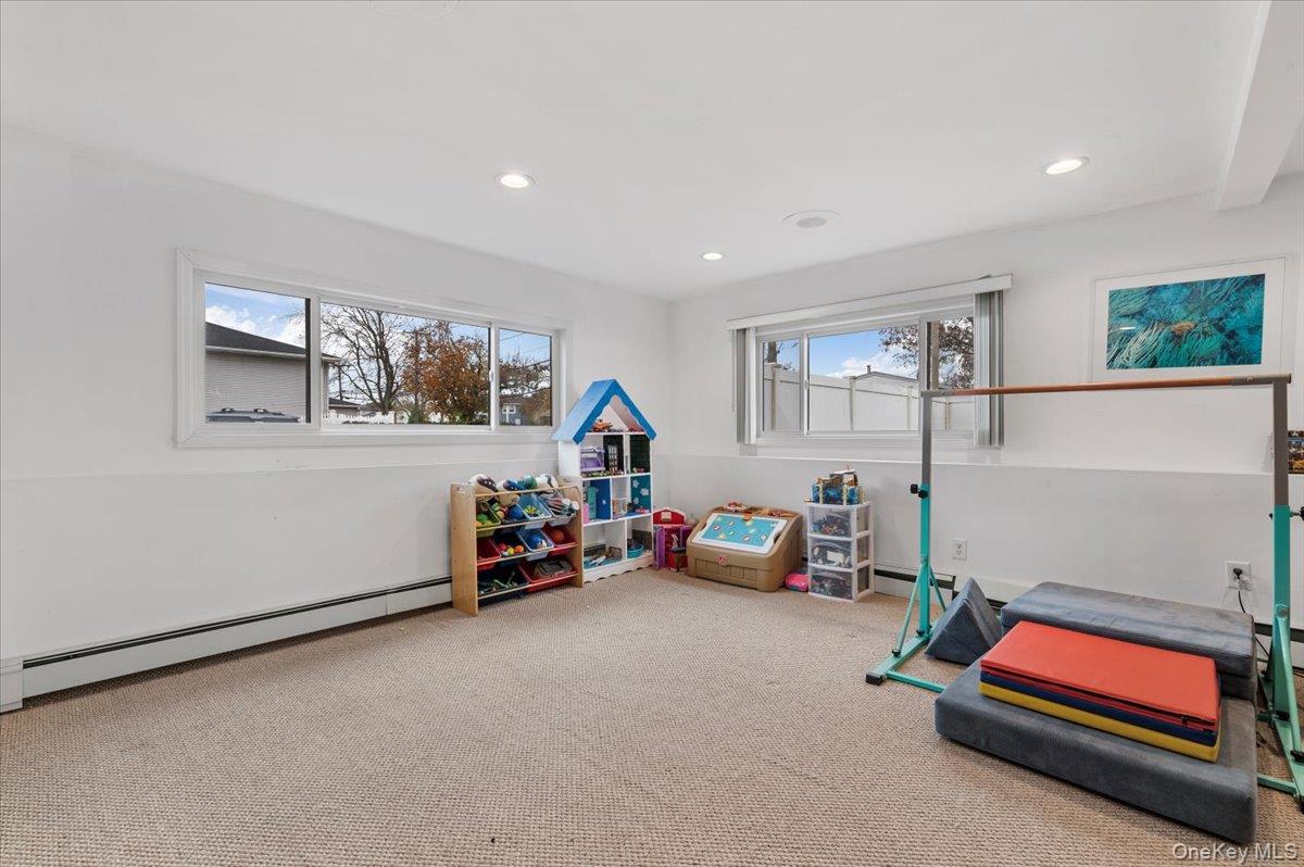 2747 Barbara Road Bellmore, NY 11710 - Photo 18 of 30 Large Den/Family Room With Great Natural Light, Space and Storage.